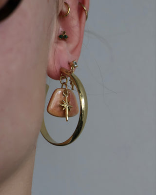 Boucles d'oreilles encerclée astrum